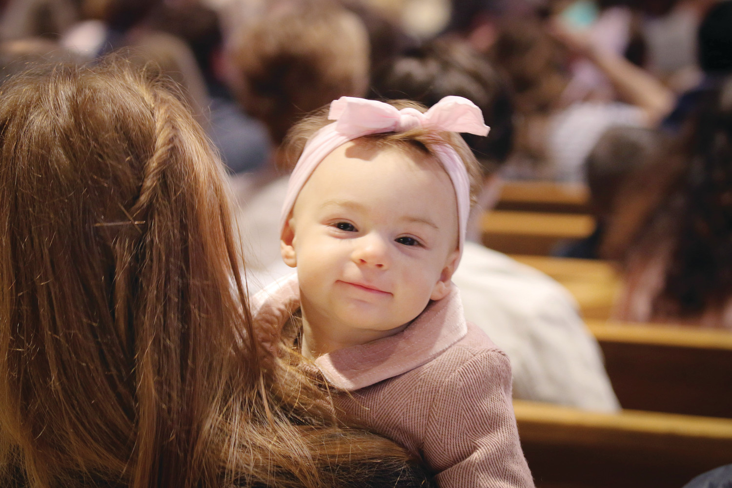 The smiling face of Angelina lights up the cathedral on Easter.